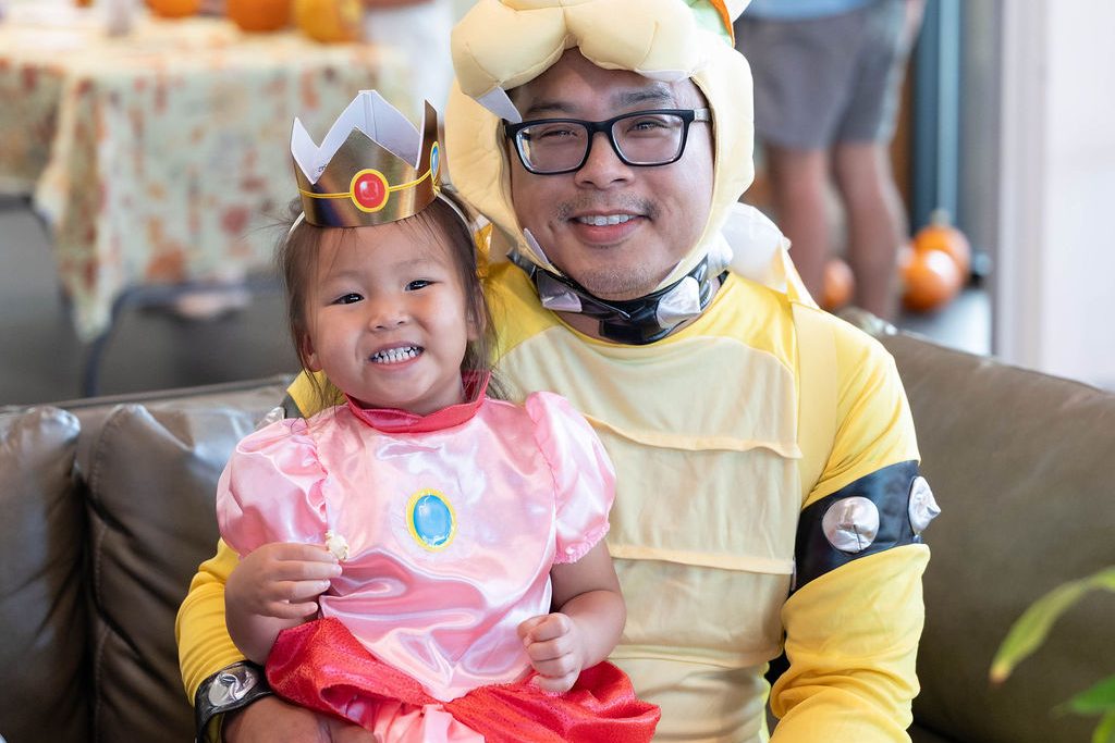 Father and daughter dressed as Bowser and Princess Peach Father and daughter dressed as Bowser and Princess Peach